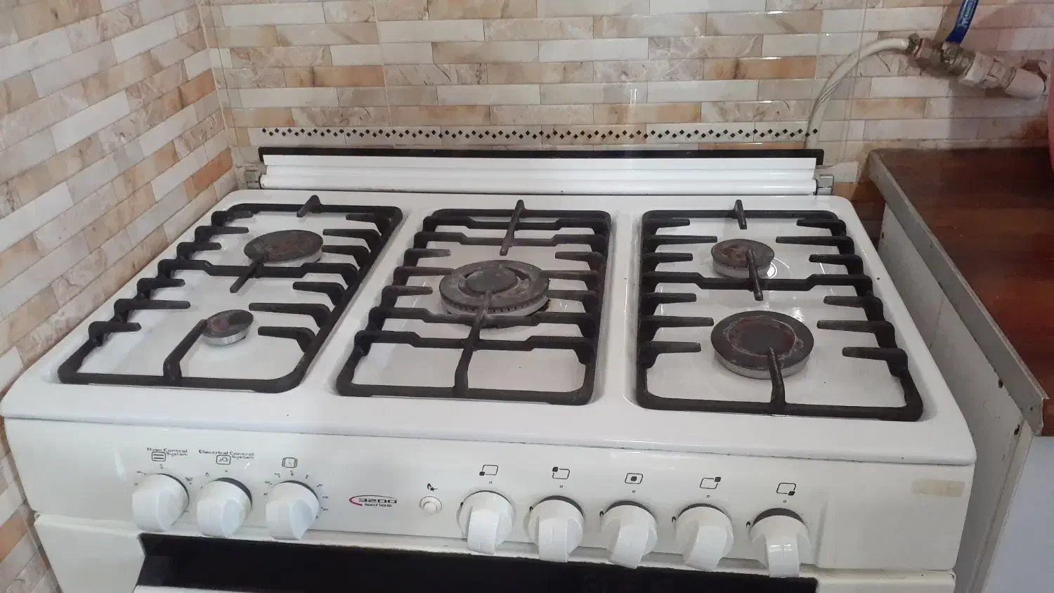 گاز سنجر|اجاق گاز و لوازم برقی پخت‌وپز|رشت, باهنر|دیوار