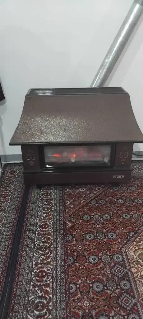 بخاری نیک کالا طرح شومینه دار|بخاری، هیتر، شومینه|پارس‌آباد, |دیوار