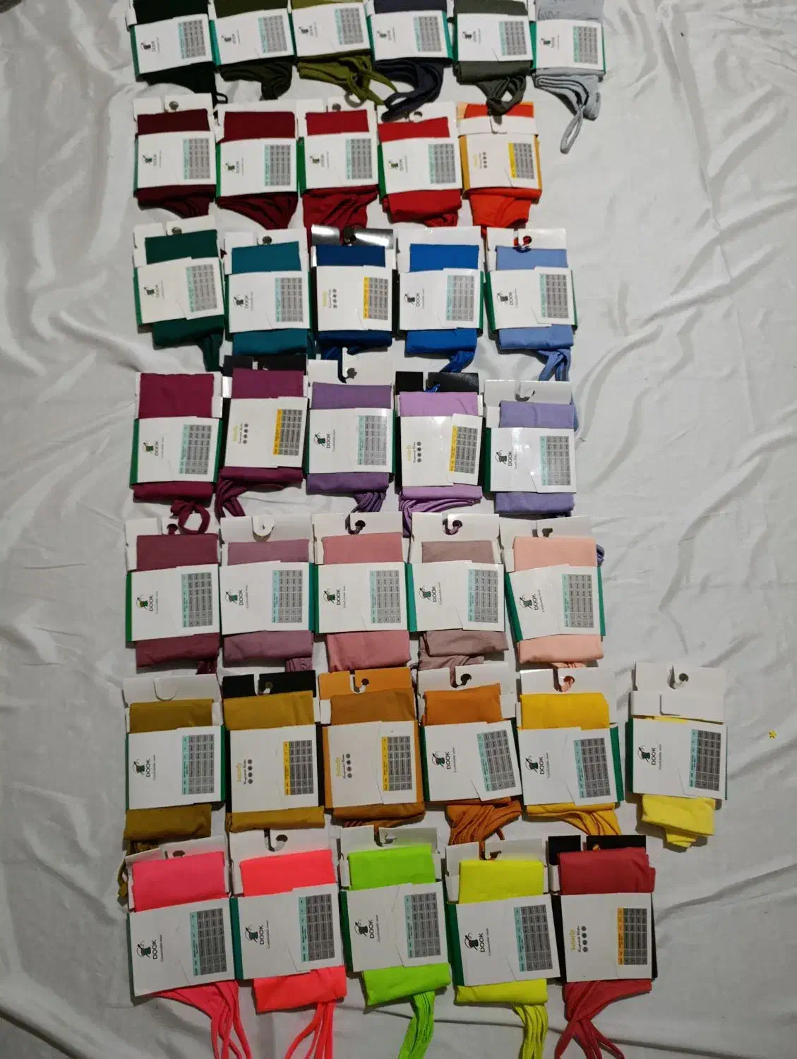 تاپ بندی برند دوک بسته بندی اصلی شرکت|لباس|قزوین, |دیوار