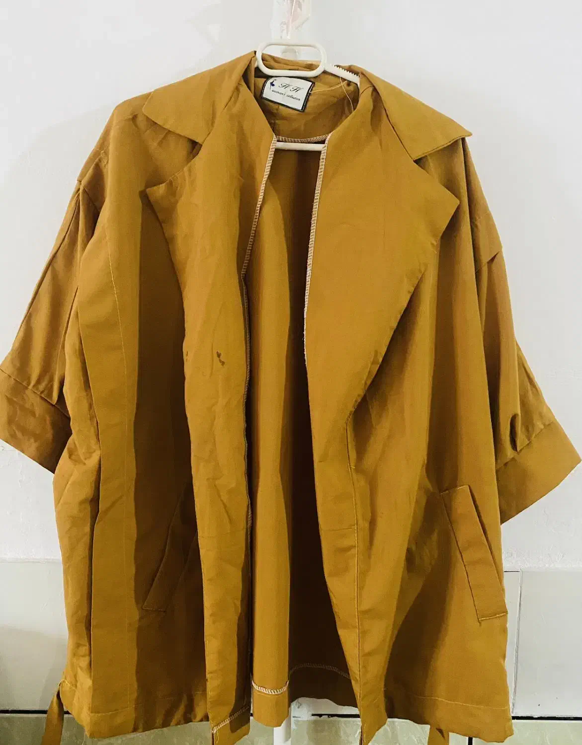 تعدادی مانتو نو|لباس|کلاله, |دیوار