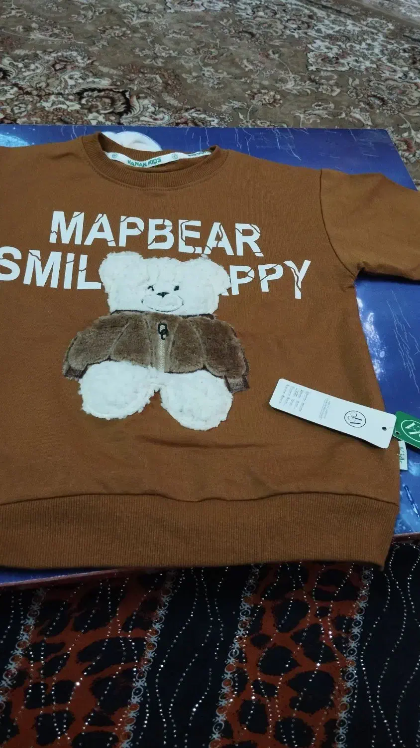 لباس بچگونه|کفش و لباس بچه|اهواز, کمپلو جنوبی|دیوار