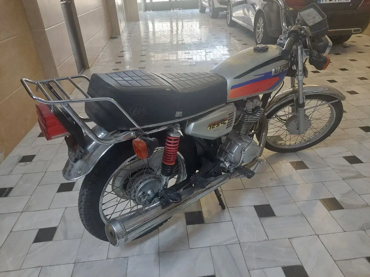 هندا ۱۲۵ لیفان مدل ۹۹|موتورسیکلت|قم, هفت تیر|دیوار