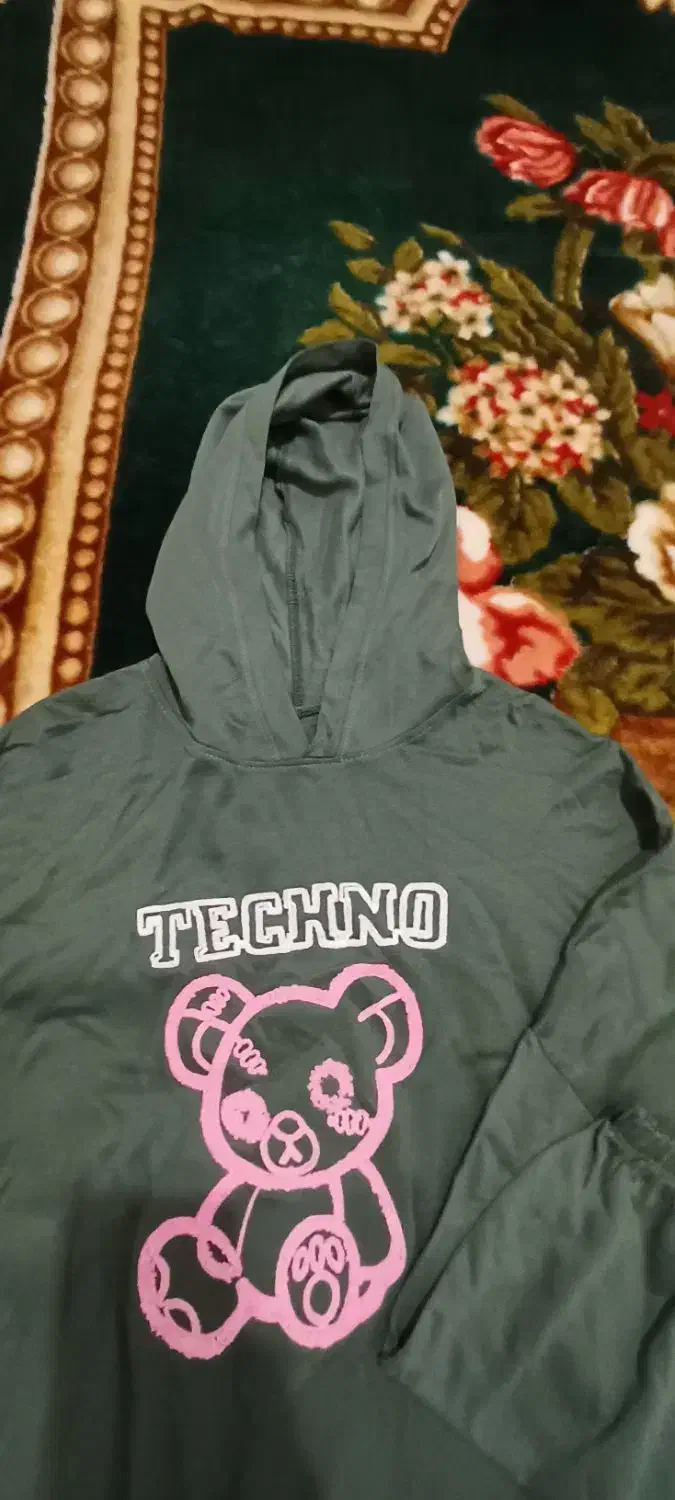 هودی کلاه دار|لباس|قدس, شهرقدس|دیوار