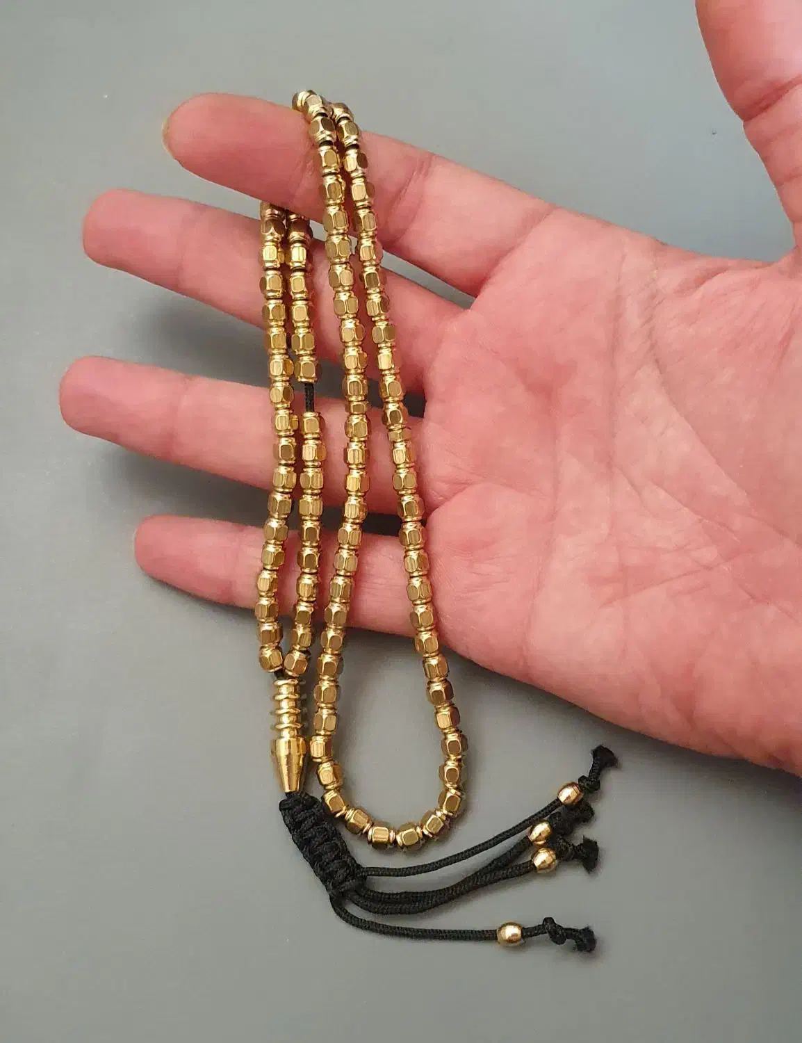 تسبیح فلز برنجی طلایی ۱۰۱دانه رنگ ثابت شش وجهی|بدلیجات|تهران, فلسطین (میدان انقلاب)|دیوار