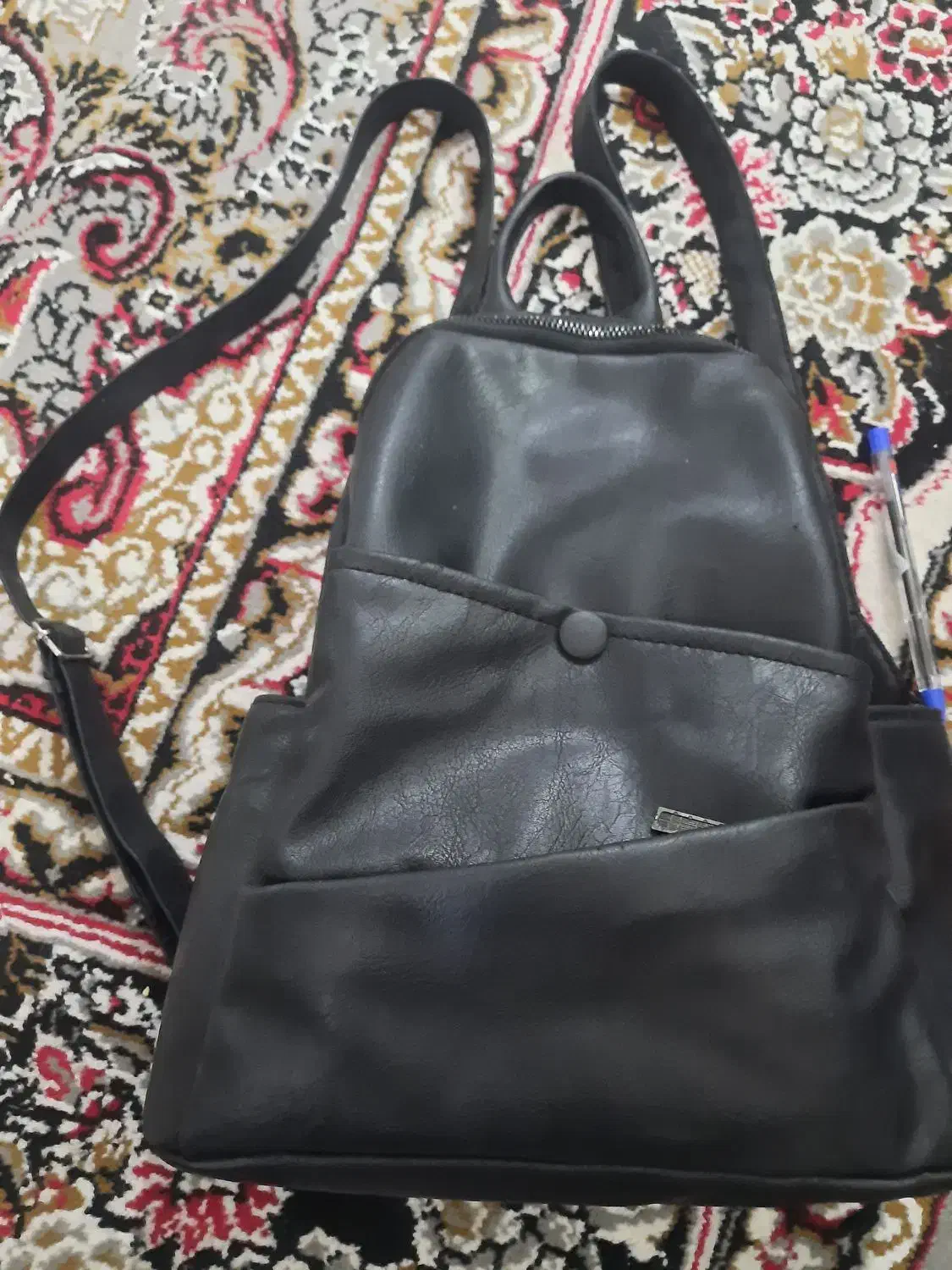 کیف مشکی|کیف، کفش، کمربند|کاشان, شاهد|دیوار