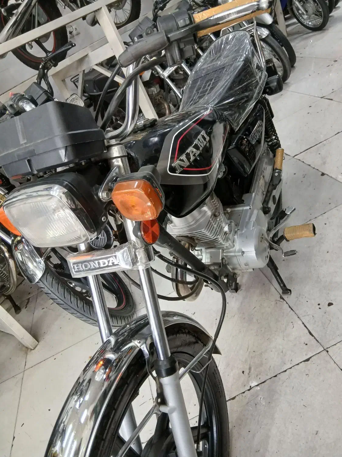 نامی|موتورسیکلت|مشهد, رده|دیوار