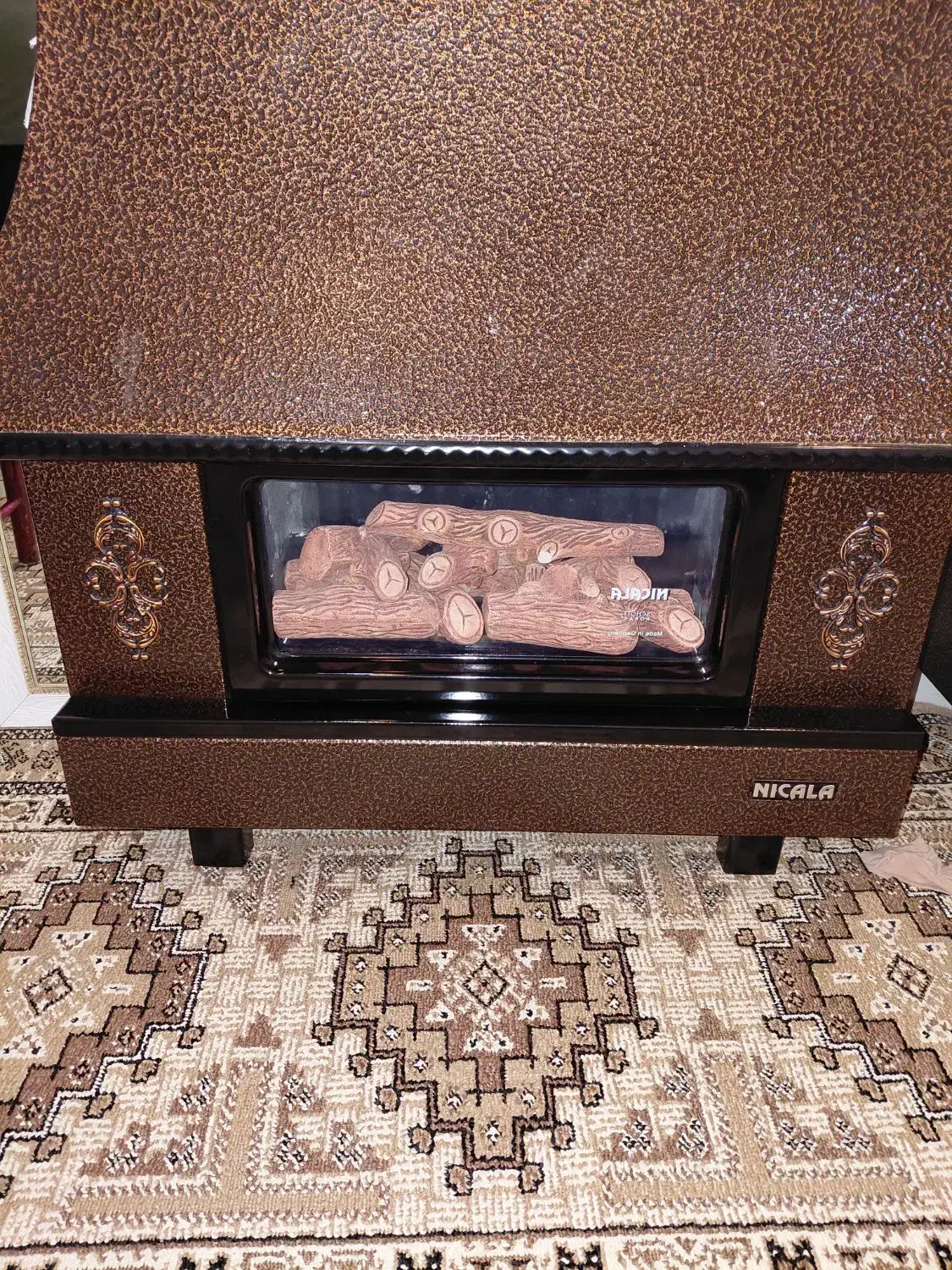 بخاری شومینه ای نیک کالا در حد نو|بخاری، هیتر، شومینه|بندر انزلی, معلم|دیوار