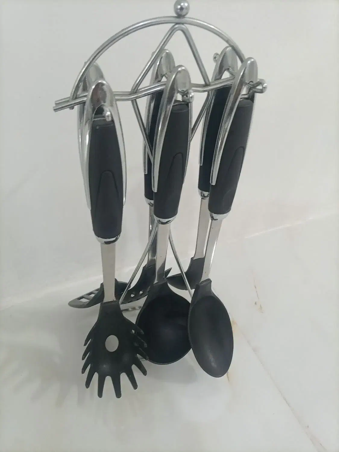 کف گیر.ملاغه|ظروف پخت‌وپز|رباط‌کریم, رباط‌کریم|دیوار