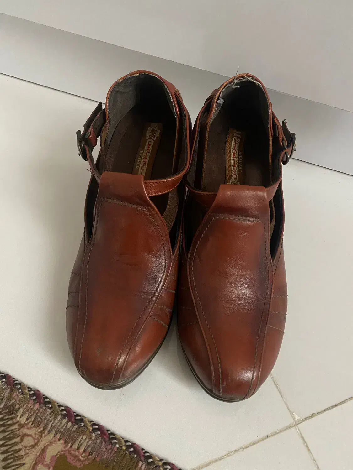 کفش چرم|کیف، کفش، کمربند|رشت, فلسطین|دیوار