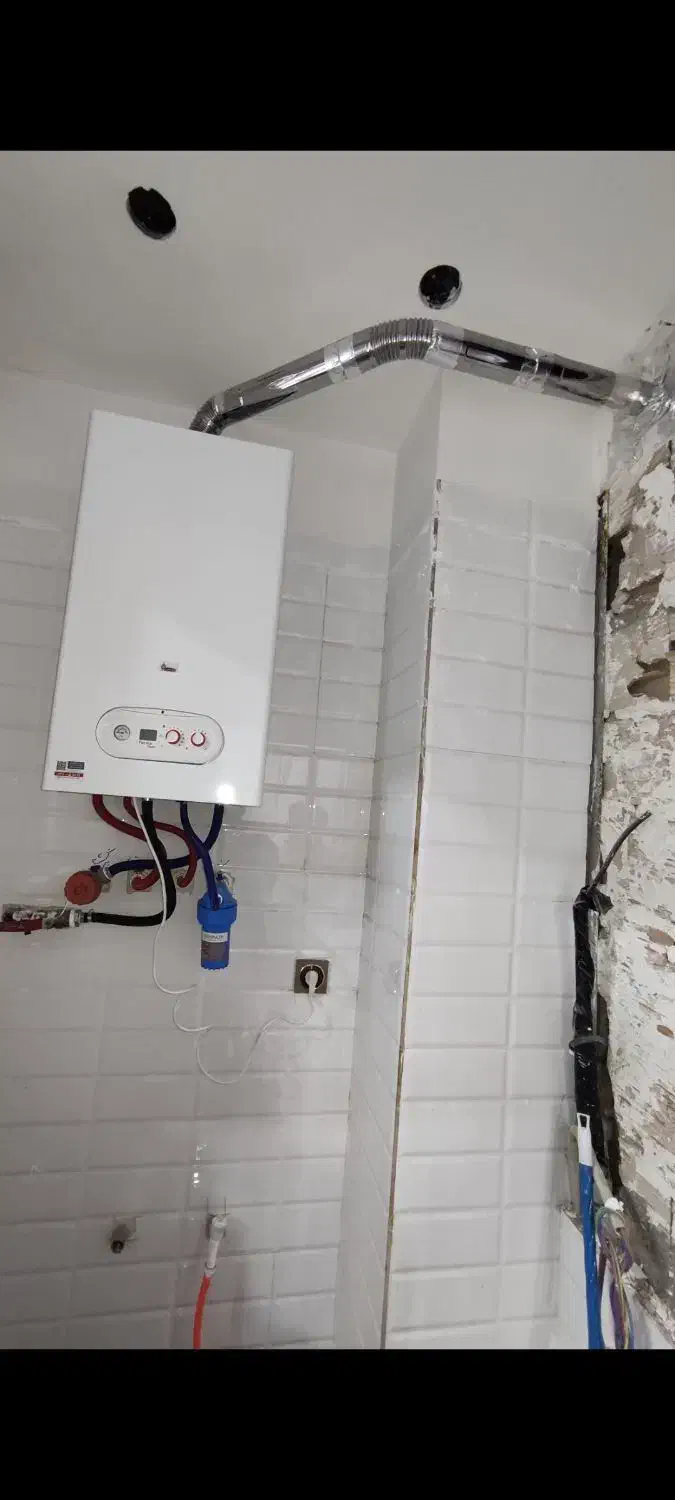 تعمیر فوق تخصصی انواع پکیج بوتان و ایران رادیاتور|خدمات پیشه و مهارت|کرج, چهارصد دستگاه|دیوار