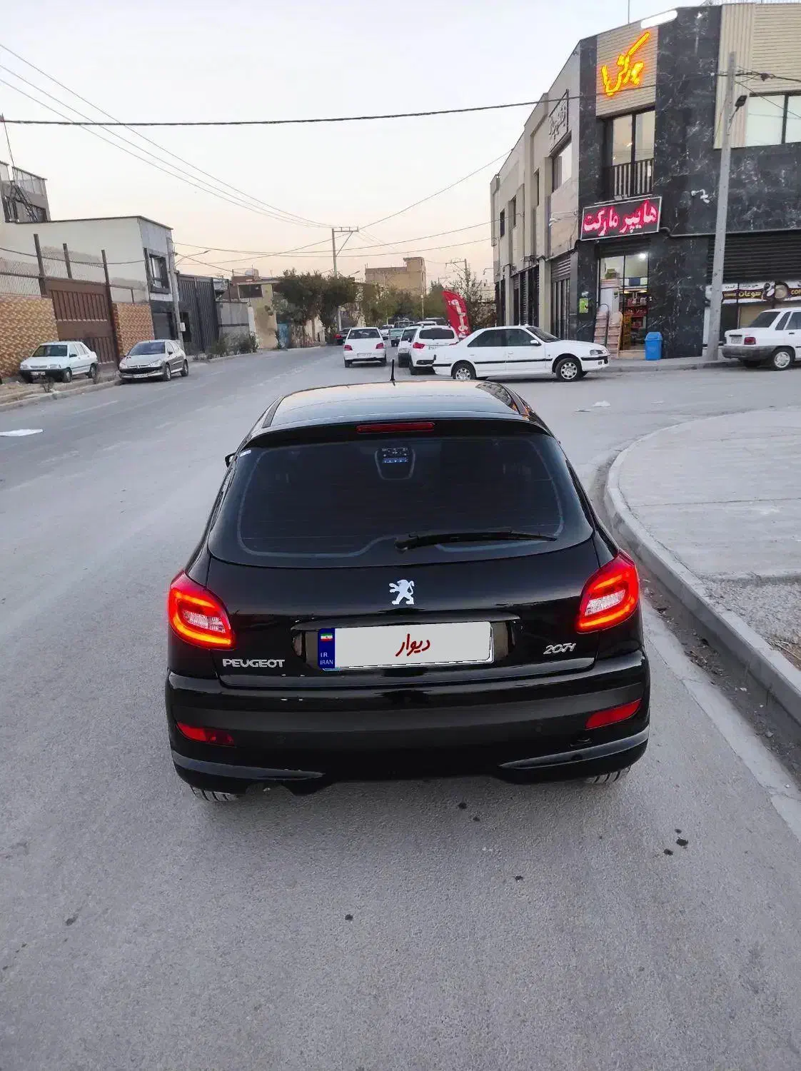 207مشکی سقف فلز هیدرولیک مدل 1404|خودرو سواری و وانت|اصفهان, برازنده|دیوار