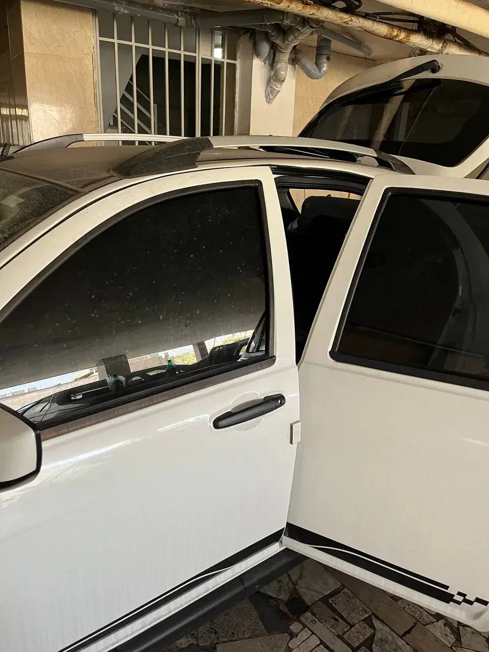 نصب شیشه دودی انواع خودرو با ضمانت در محل شما|خدمات موتور و ماشین|تهران, جنت‌آباد مرکزی|دیوار