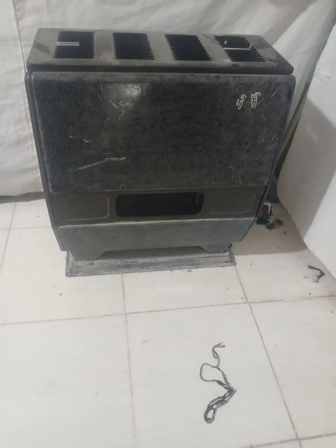 بخاری،چراغ نفتی،صندلی،استند،قفسه کتاب|بخاری، هیتر، شومینه|سرپل ذهاب, |دیوار