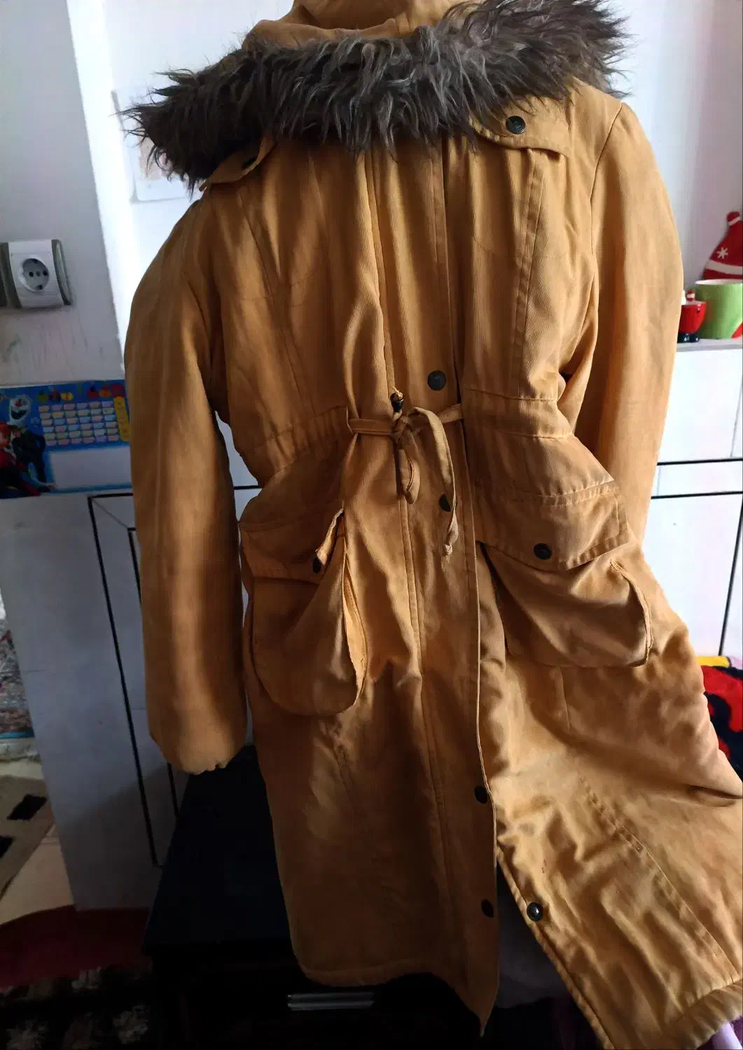 کاپپشن|لباس|نجف‌آباد, منتظری شمالی|دیوار