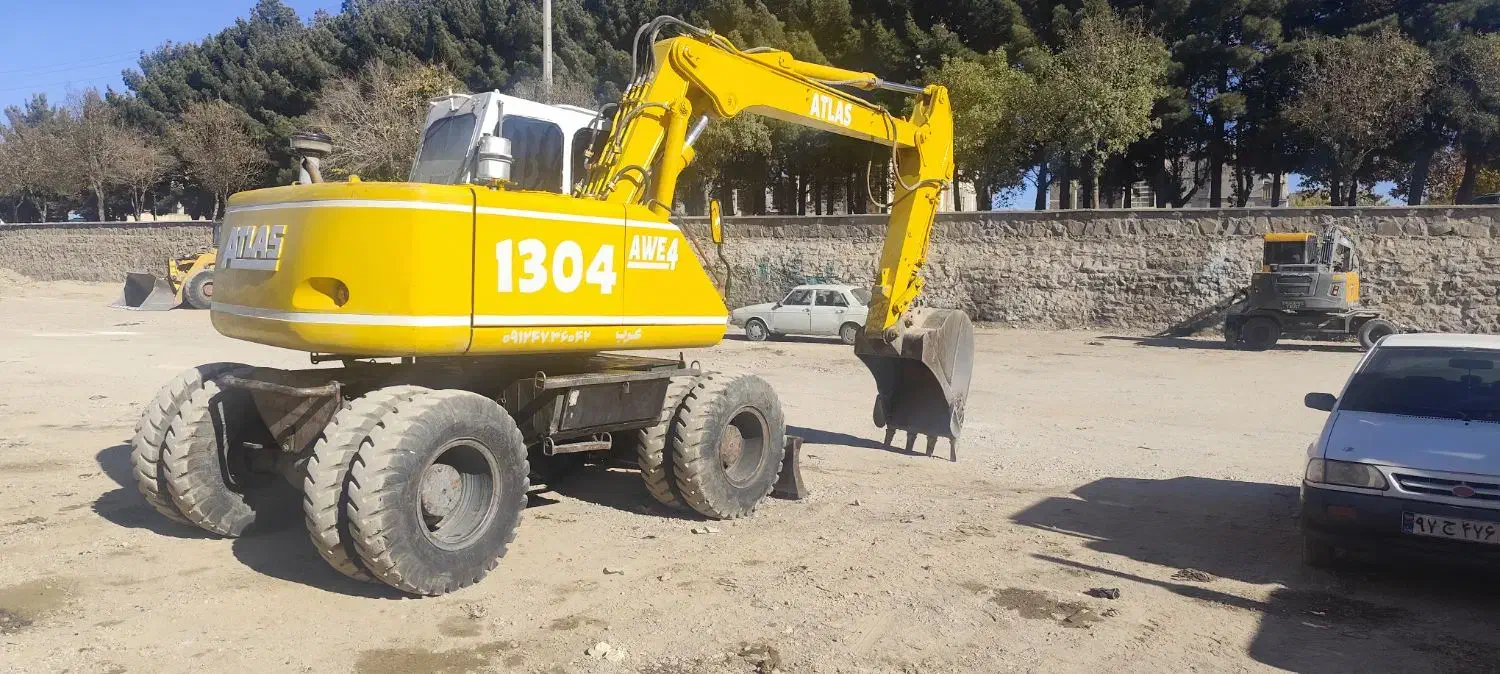 فروش بیل مکانیکی لاستیکی اطلس 1304|خودرو سنگین|شاهرود, |دیوار