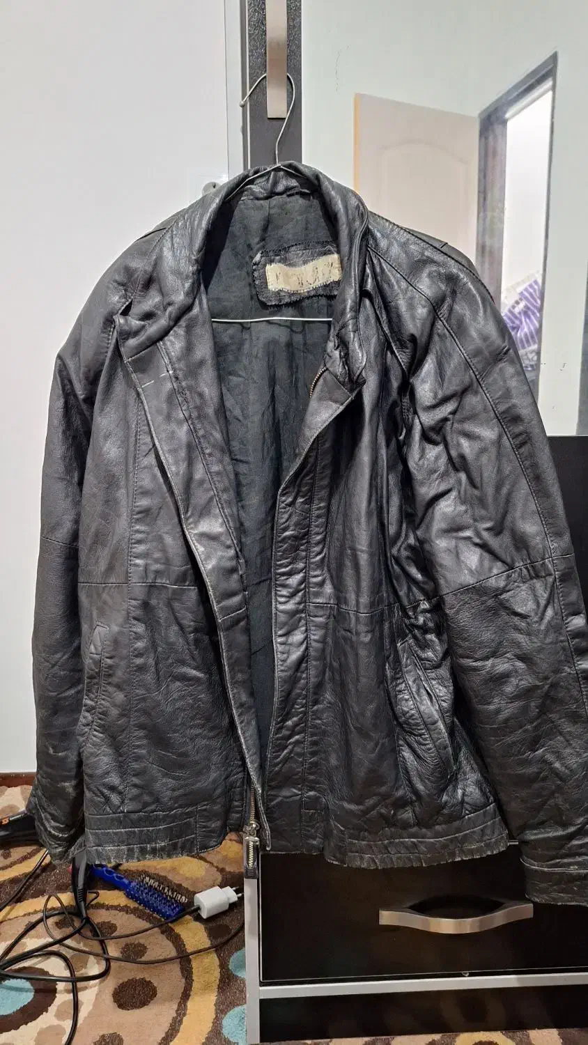 کاپشن|لباس|مسجد سلیمان, |دیوار