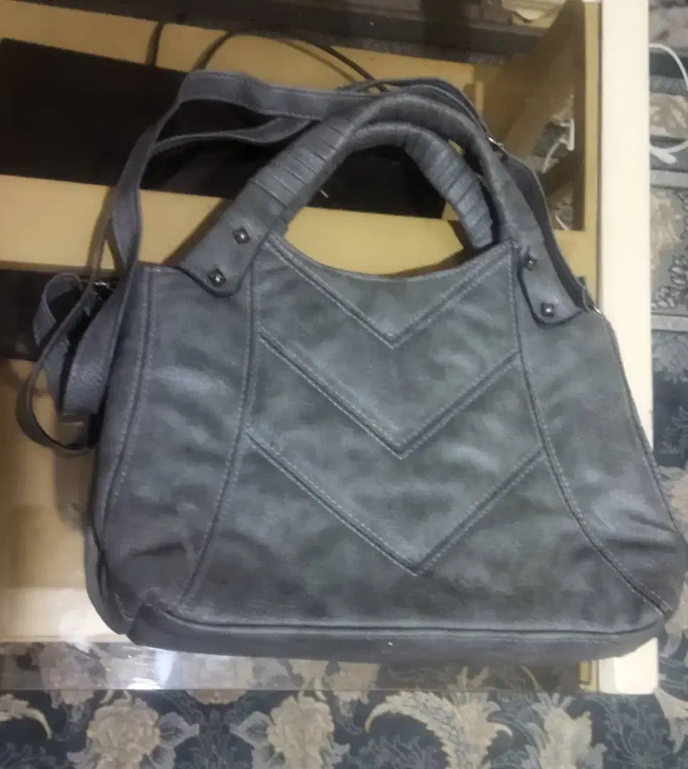 کیف مجلسی|کیف، کفش، کمربند|قدس, شهر‌قدس|دیوار