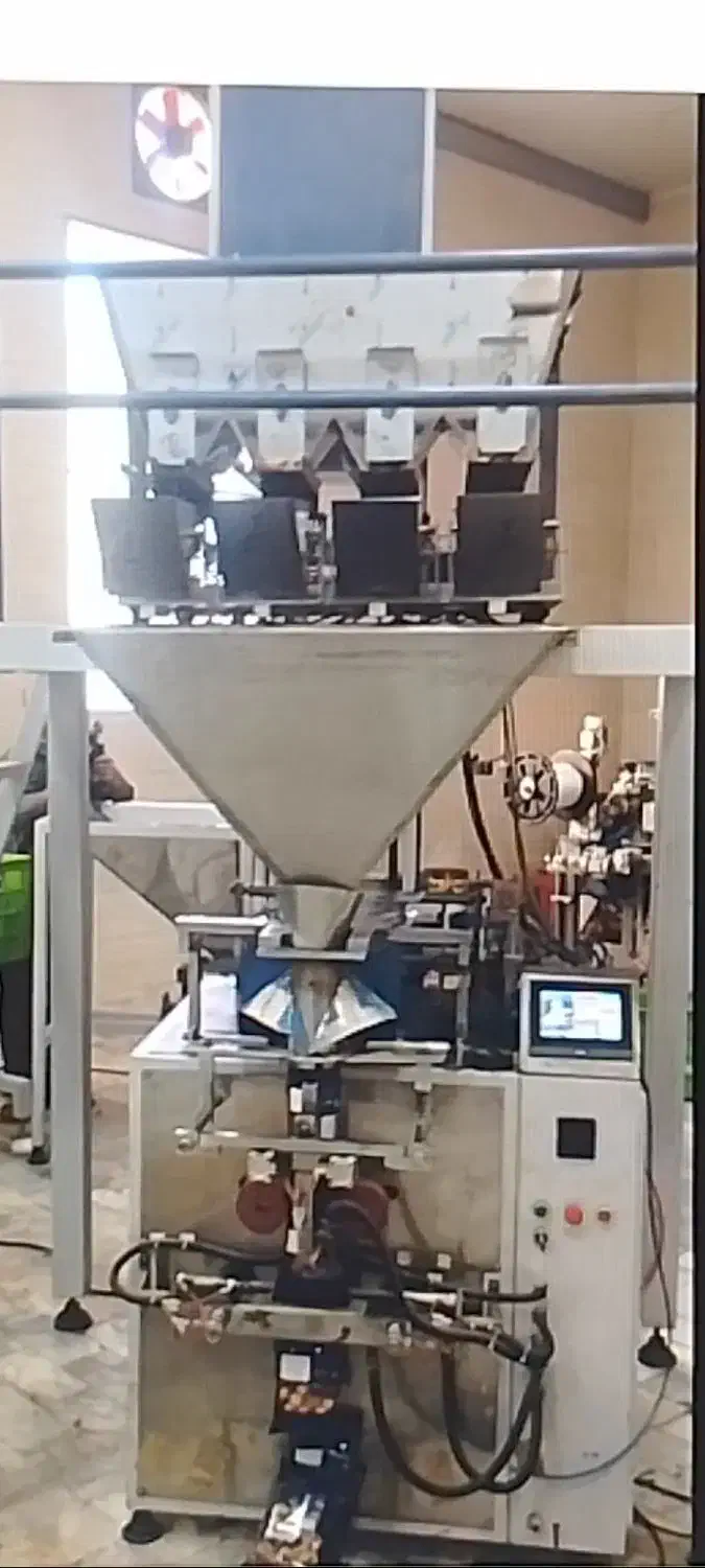 دستگاه بسته بندی چهار توزین|ماشین‌آلات صنعتی|اندیشه, پرنیان|دیوار