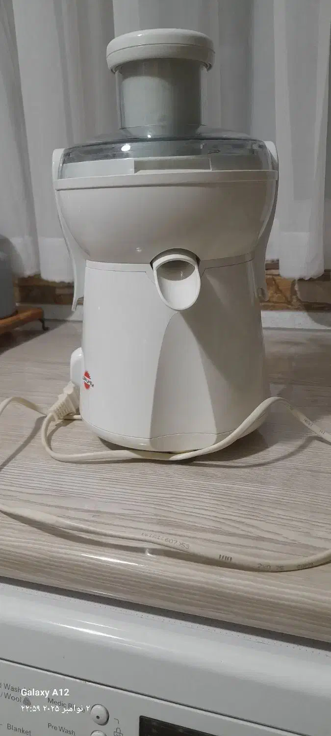 آبمیوه گیری پارس خزر|آبمیوهگیر و آبمرکباتگیر|رشت, دروازه لاکان|دیوار