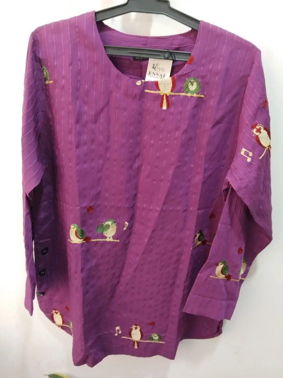 لباس نو|لباس|قم, باسکول|دیوار