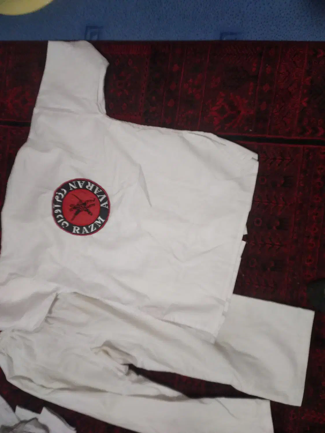 لباس ورزم آوران و تکواندو و هوگو و کمربند|تجهیزات ورزشی|سورک, |دیوار