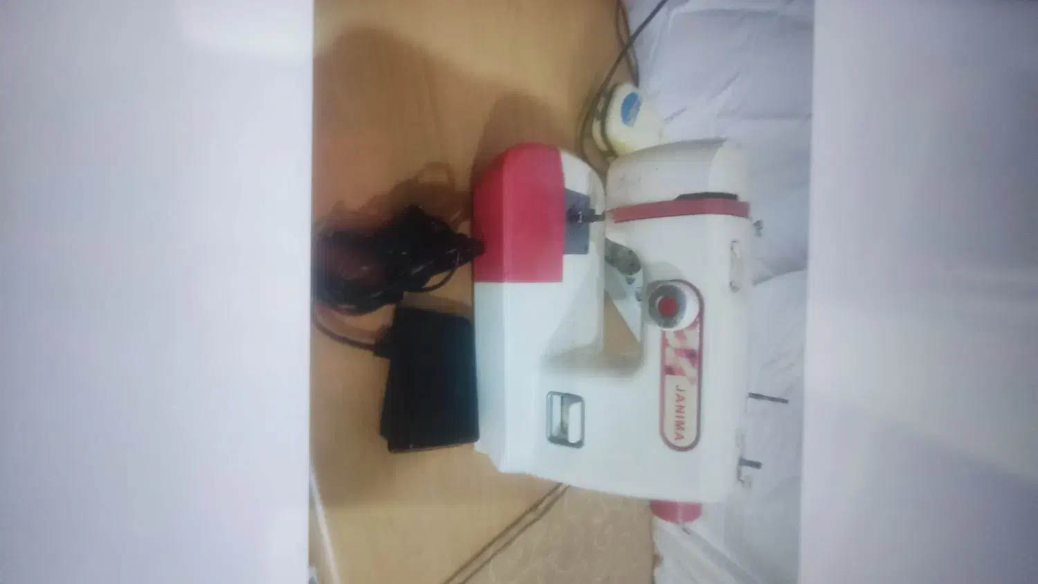 چرخ خیاطی|چرخ خیاطی و ریسندگی|قدس, شهر‌قدس|دیوار