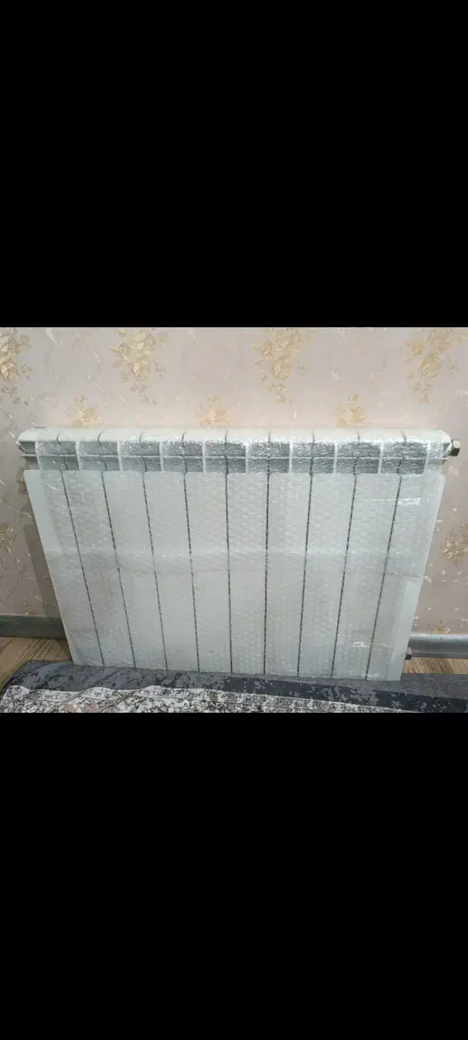 رادیاتور ده پره آلومینیومی در حد نو|آبگرمکن، پکیج، شوفاژ|هشتگرد, شهرک مهستان ۱|دیوار