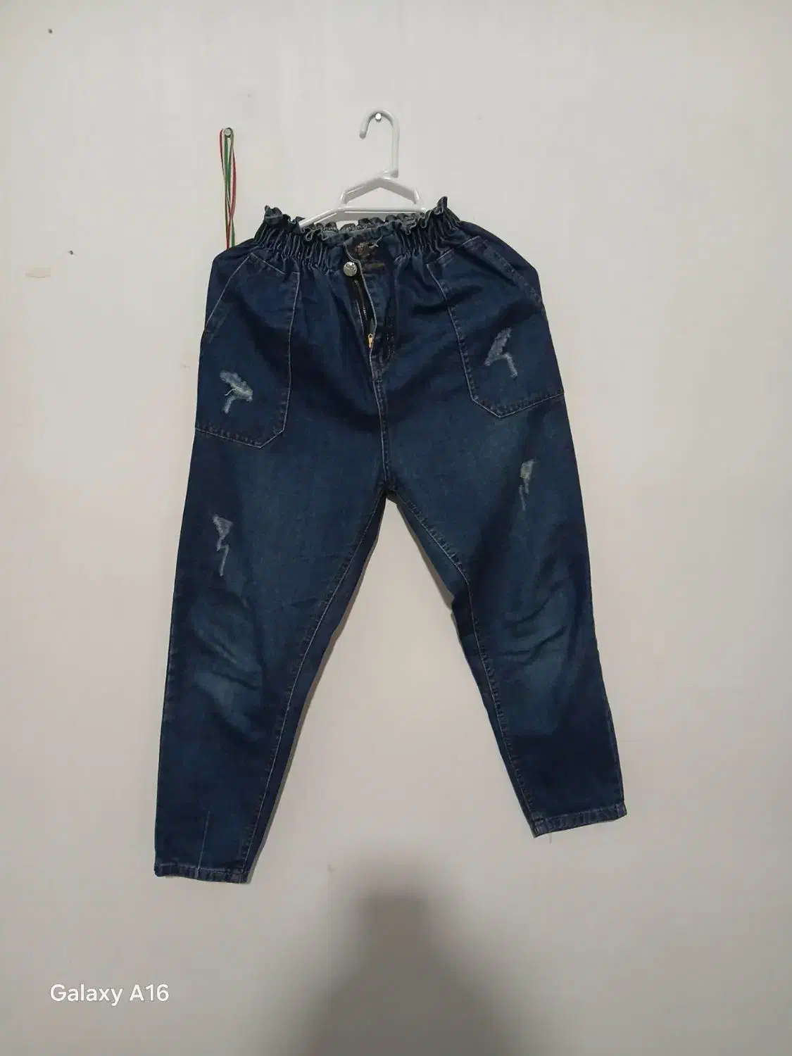 شلوار|لباس|کنگاور, |دیوار