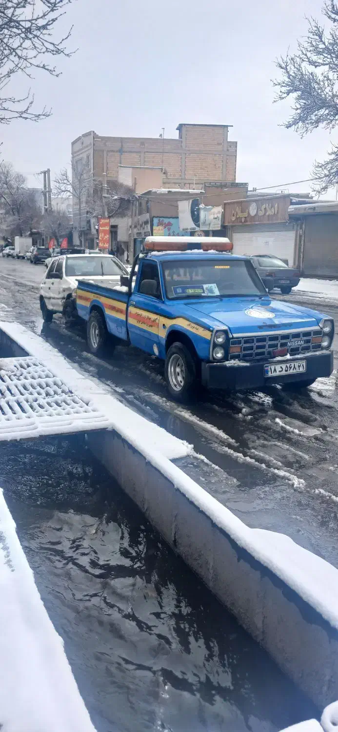 یدک کش چرخگیر|خدمات حمل و نقل|هشتگرد, هشتگرد قدیم|دیوار