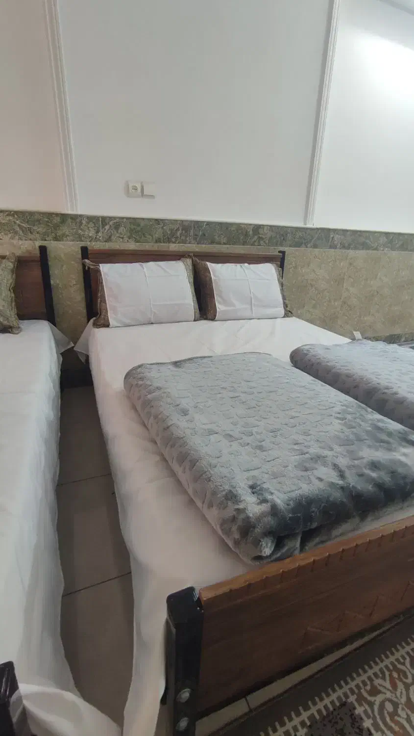 سوییت هتل مهمانپذیر با پارکینگ نزدیک حرم|اجارهٔ کوتاهمدت آپارتمان و سوئیت|قم, قم نو|دیوار