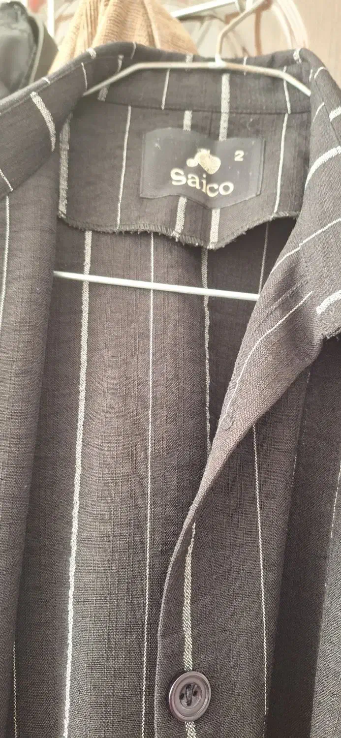 مانتو مشکی در حد|لباس|قم, قلعه کامکار|دیوار