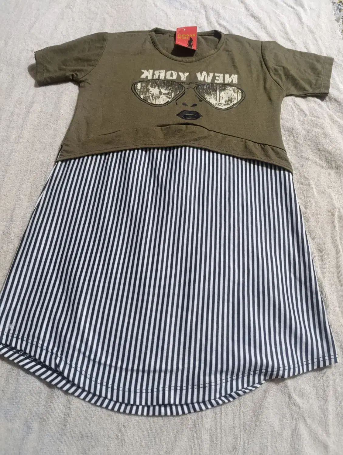 مانتووتونیک|کفش و لباس بچه|اهواز, کوی طلاب|دیوار