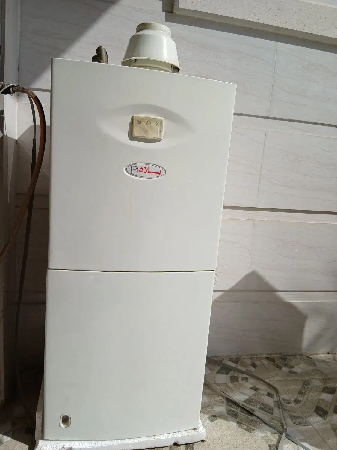 فروش آبگرمکن دیواری ۵۰ لیتری بلاد کارکرده.|آبگرمکن، پکیج، شوفاژ|جهرم, |دیوار