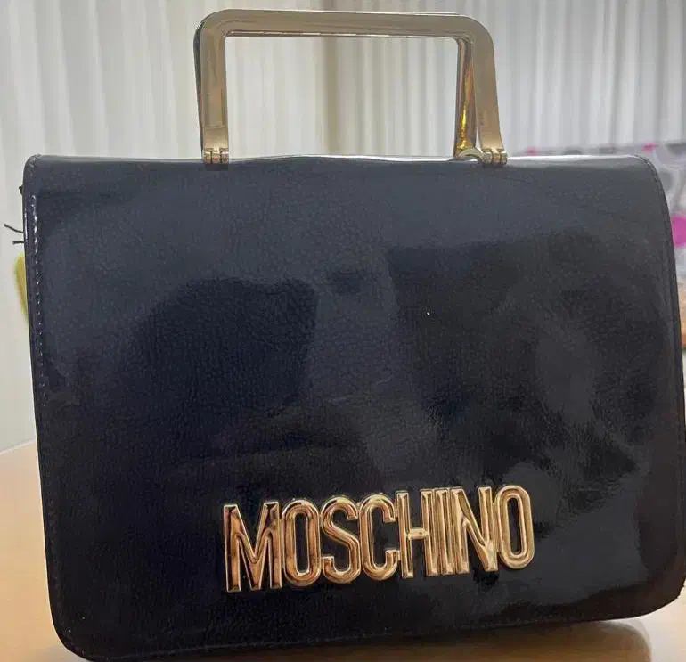 کیف|کیف، کفش، کمربند|شیراز, میرزاکوچک خان|دیوار