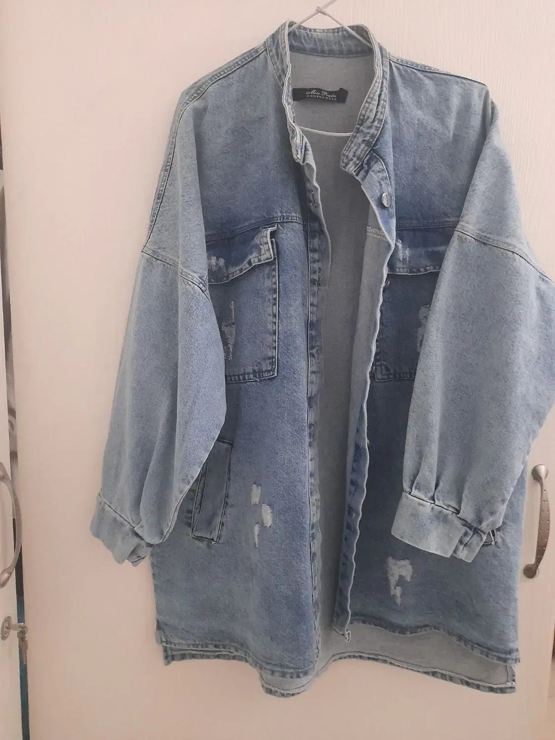 کت لی|لباس|تهران, جوانمردان (اندیشه)|دیوار