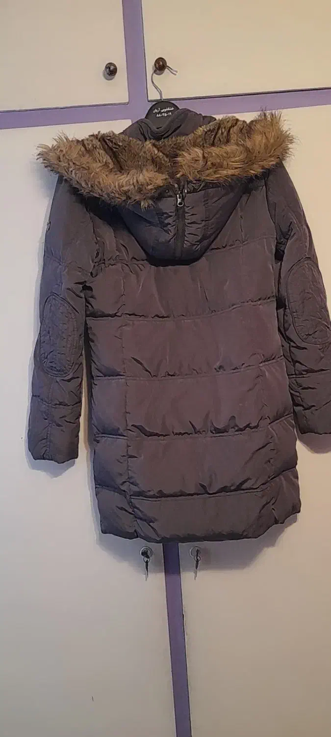 کاپشن|لباس|تهران, آسمان|دیوار