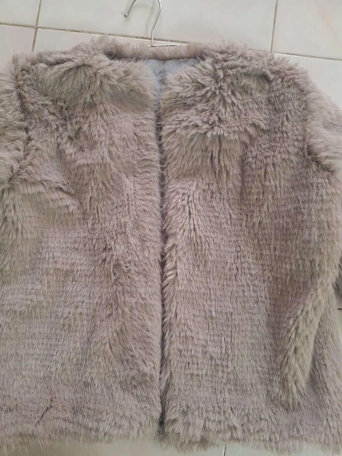 کت خز|لباس|کاشان, شهید زجاجی|دیوار