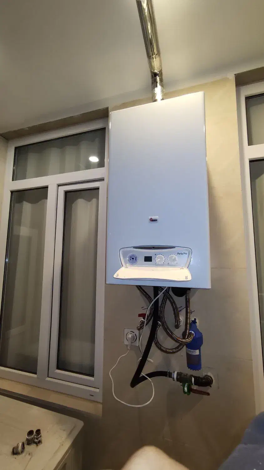 تعمیر فوق تخصصی انواع پکیج بوتان و ایران رادیاتور|خدمات پیشه و مهارت|کرج, چهارصد دستگاه|دیوار