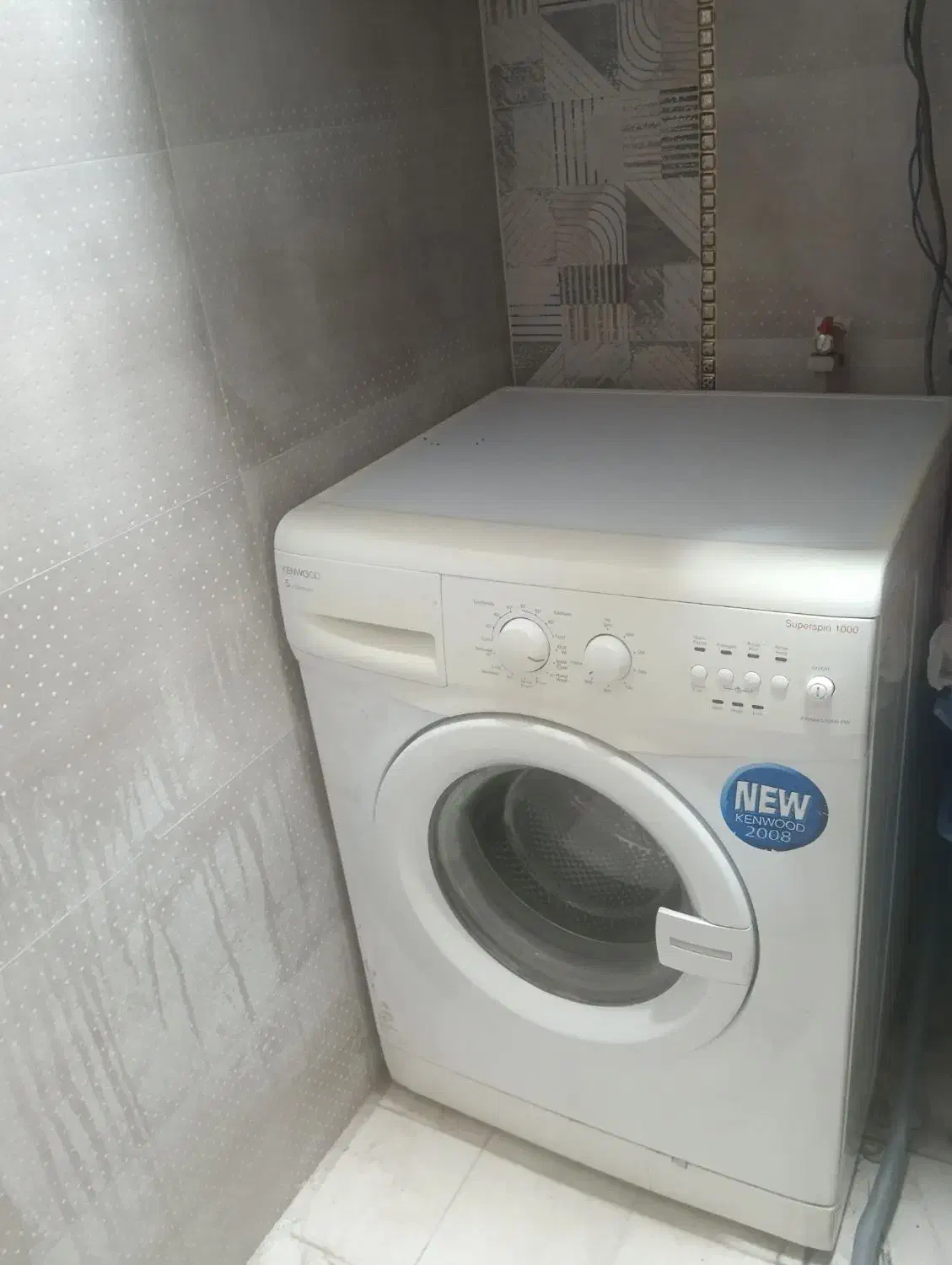 لباس شویی کن ود|ماشین لباسشویی و خشک‌کن لباس|خوی, |دیوار