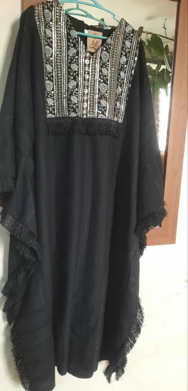 عبا|لباس|شاهین‌شهر, خانه کارگر|دیوار