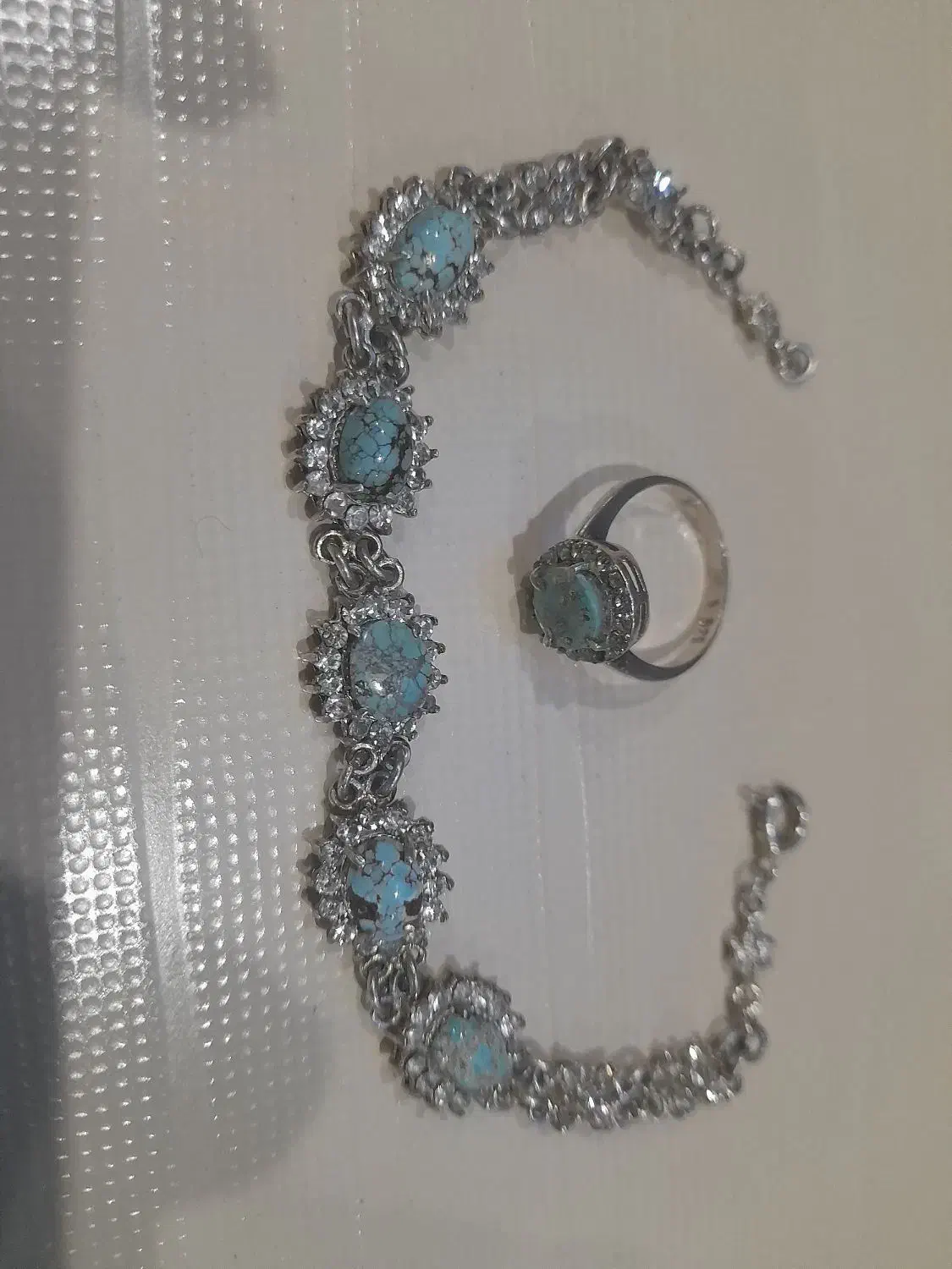 دستبندو انگشرنقره همراه نگینهای فیروزه اصل نیشابور|جواهرات|ملایر, |دیوار