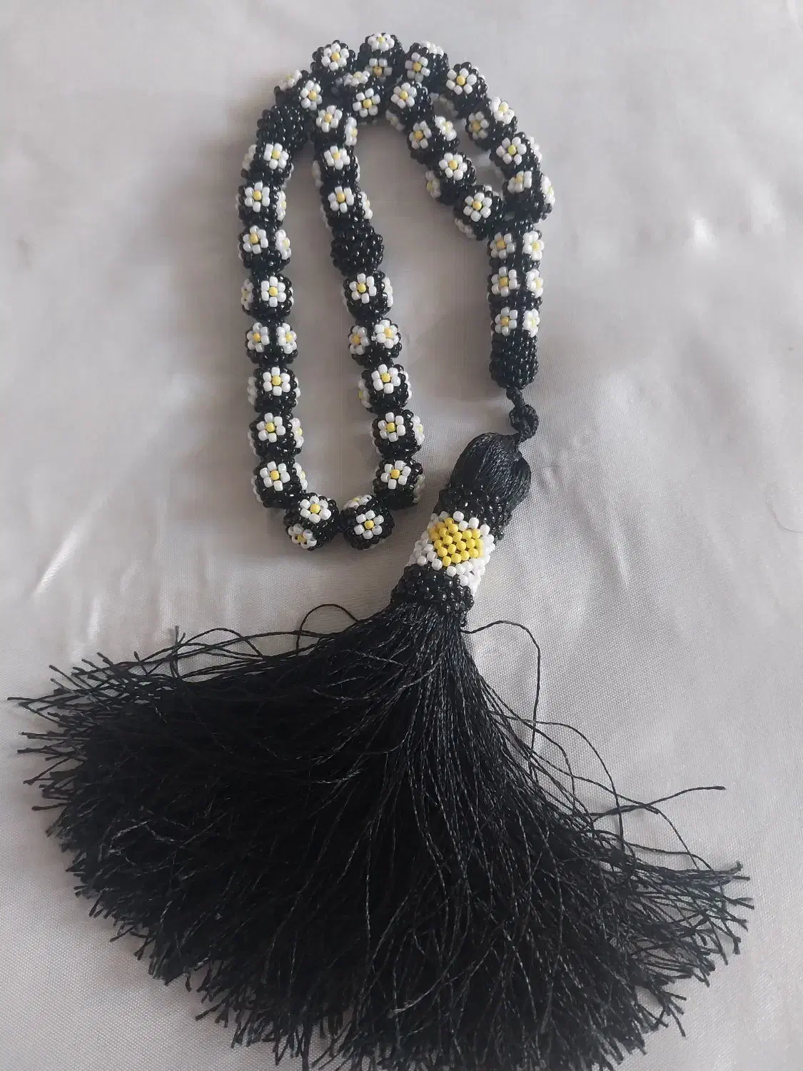 تسبیح زندان بافت طرح گل بابونه|جواهرات|جوانرود, |دیوار