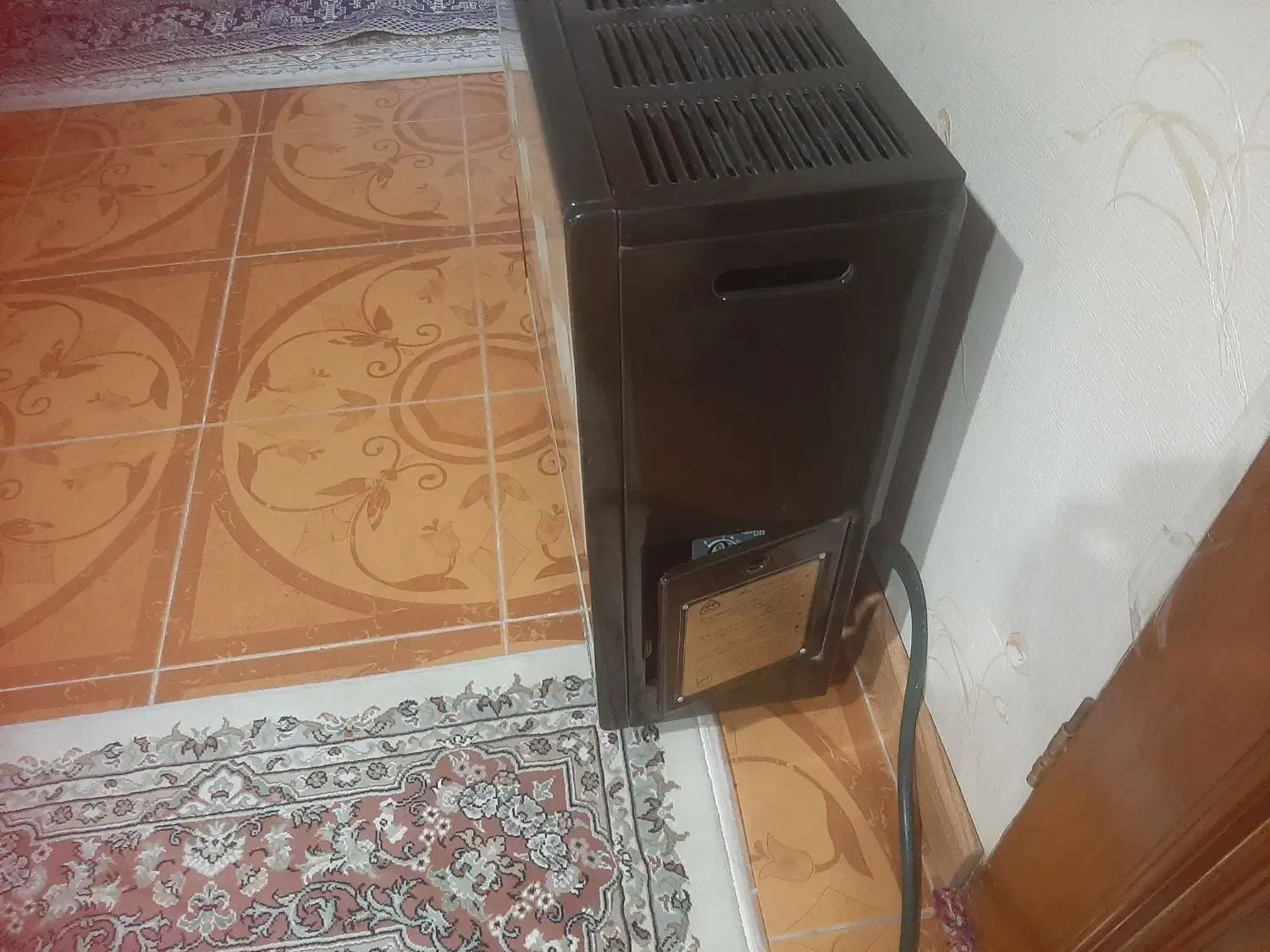 بخاری نیکلا و ساعت ایستاده|ساعت دیواری و تزئینی|بندر انزلی, ساحل قو|دیوار