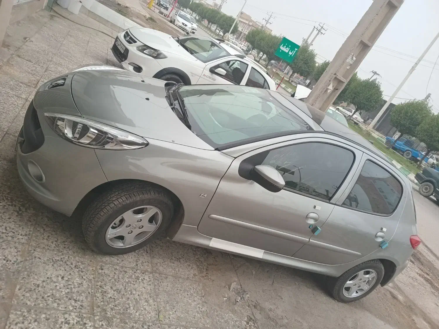 207 نقره ای تیتانیوم ارتقا فول 1404|خودرو سواری و وانت|آبادان, |دیوار