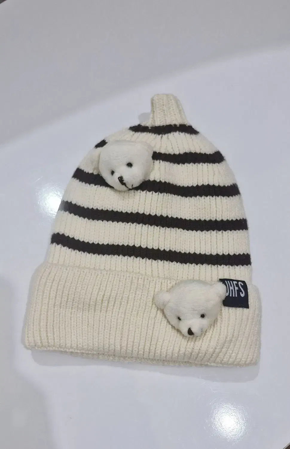 کلاه بچگانه|کفش و لباس بچه|کلاله, |دیوار