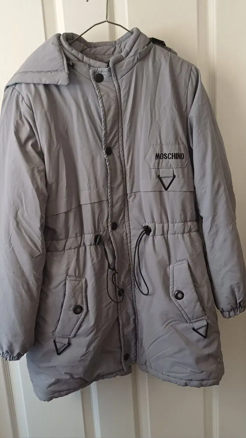 کاپشن|لباس|قم, نیروگاه|دیوار