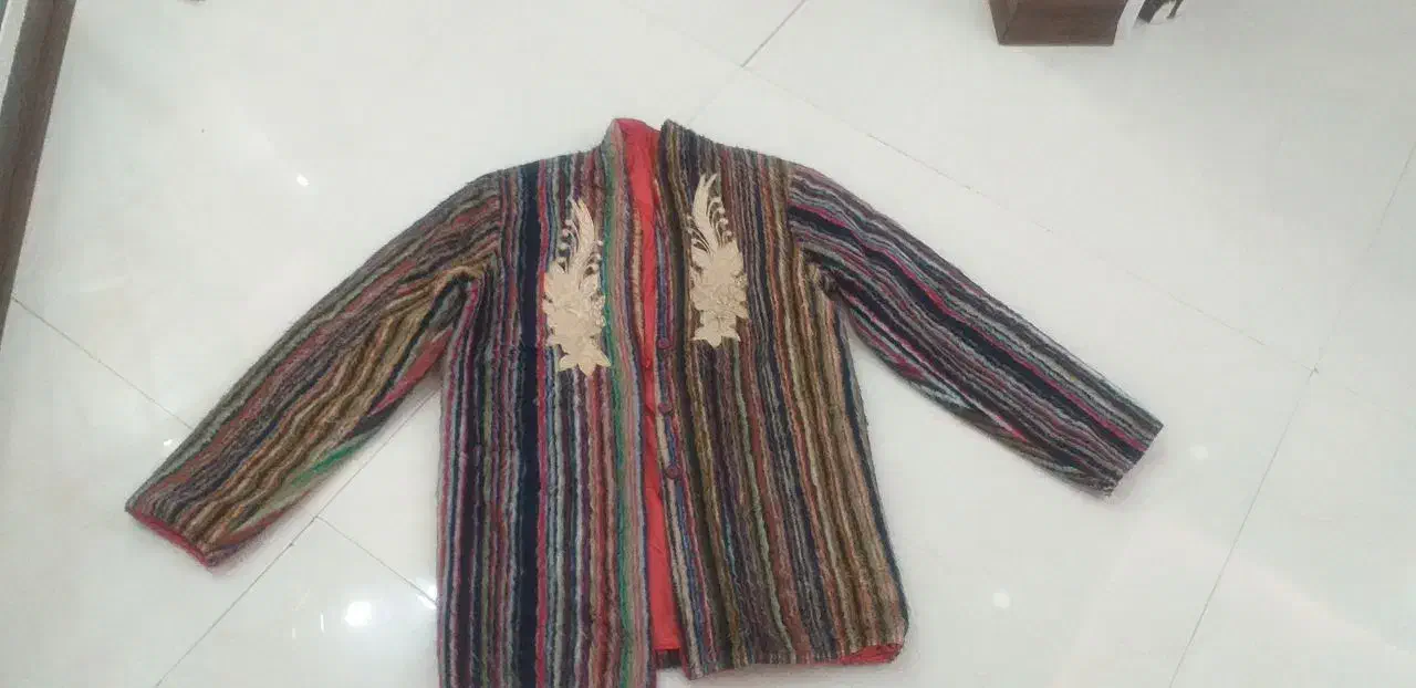 کاپشن|لباس|گلبهار, شهر جدید گلبهار|دیوار