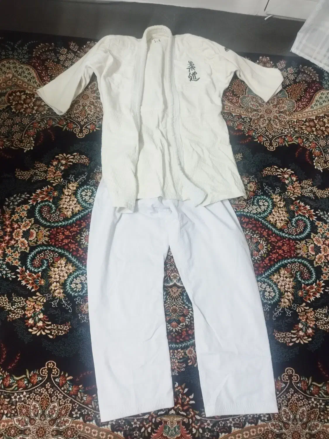 لباس تکواندو|لباس|شاهین‌شهر, نبوت|دیوار