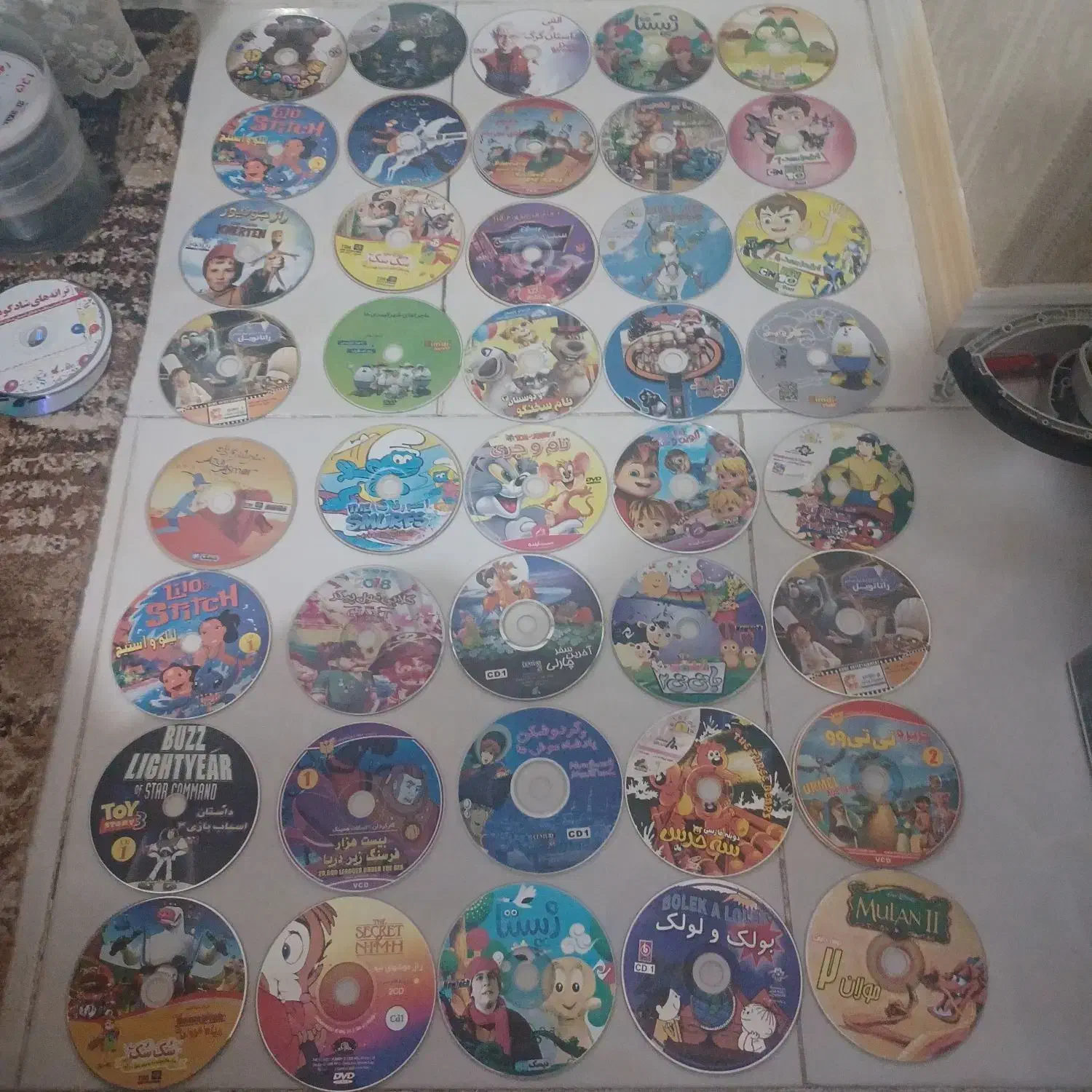 حراج ۲۴۰ عدد Dvd و cd و کارتون و موزیک و فیلم|حراج|فردیس, فردیس|دیوار