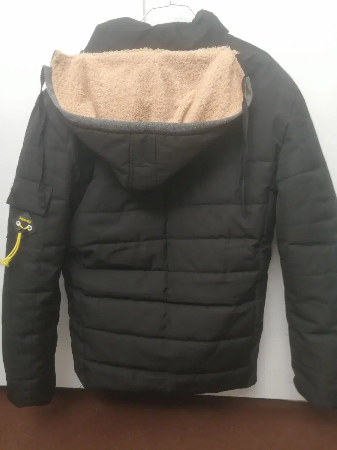 کاپشن|لباس|تربت‌حیدریه, مظفریه|دیوار